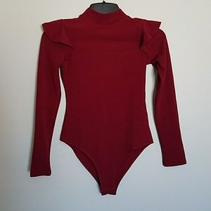 Brand new in bag bodysuit!